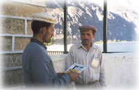 two men talking in Shimshal, Pakistan