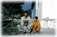 man and child in Shimshal, Pakistan