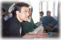 group of men having a discussion in Shimshal, Pakistan